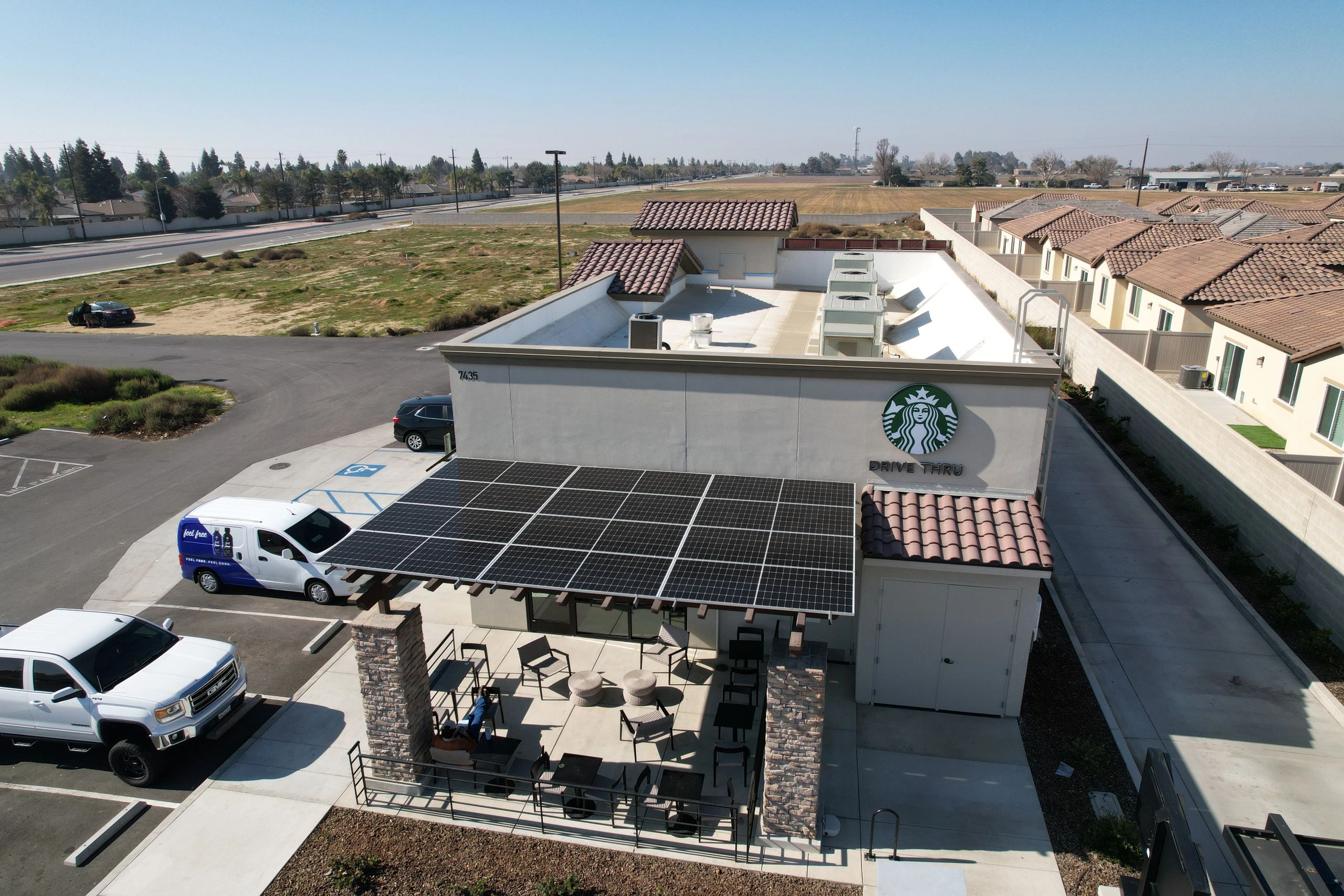 Aerial view of Starbucks Drive with rooftop solar panels