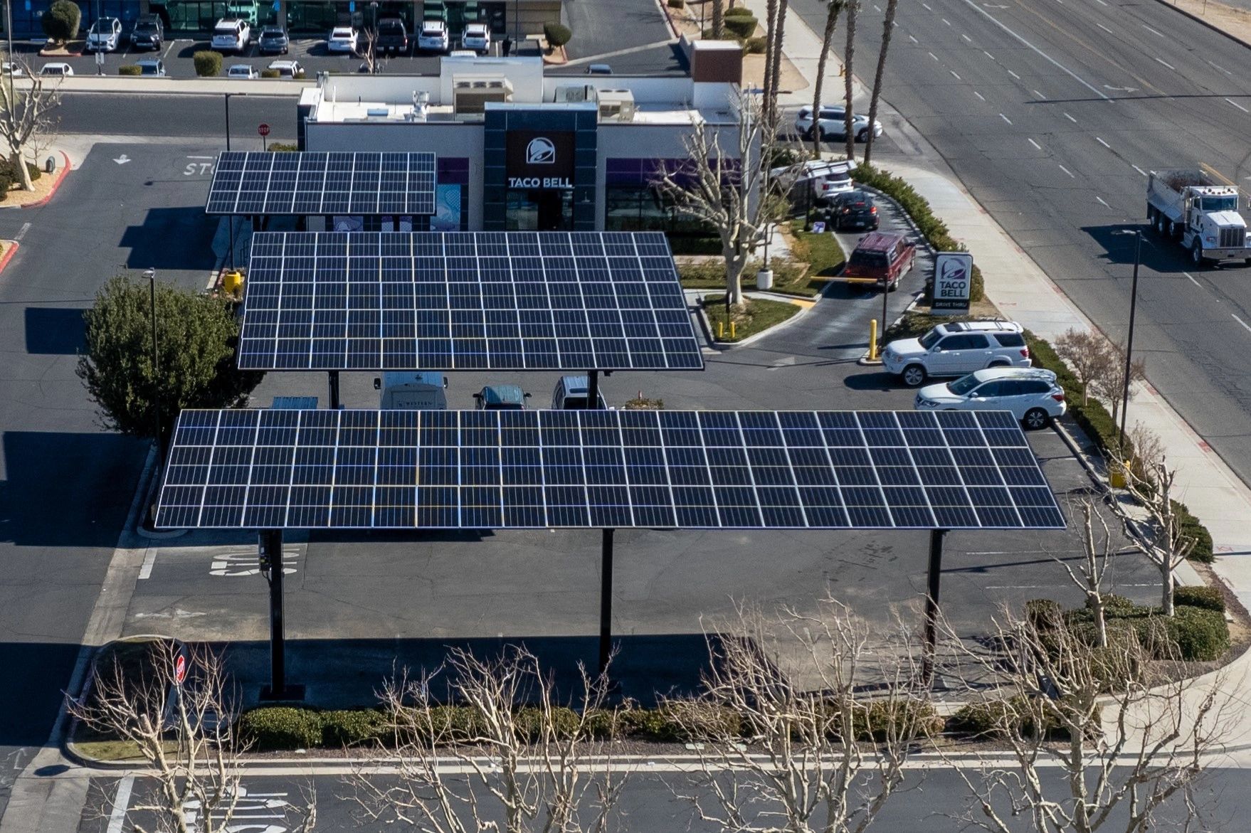 Aerial view of Taco Bell with extensive solar panel arrays