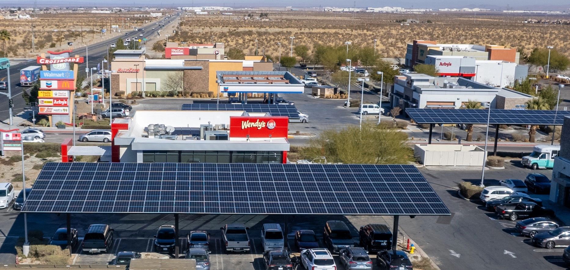 Aerial view of Wendy's and Walmart with solar installations