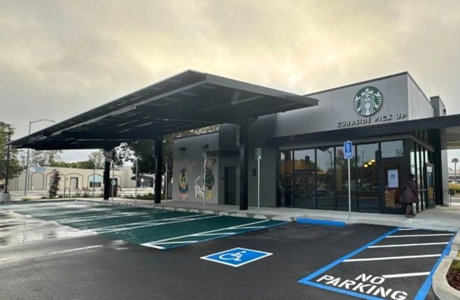 Starbucks drive-thru with solar canopy integration